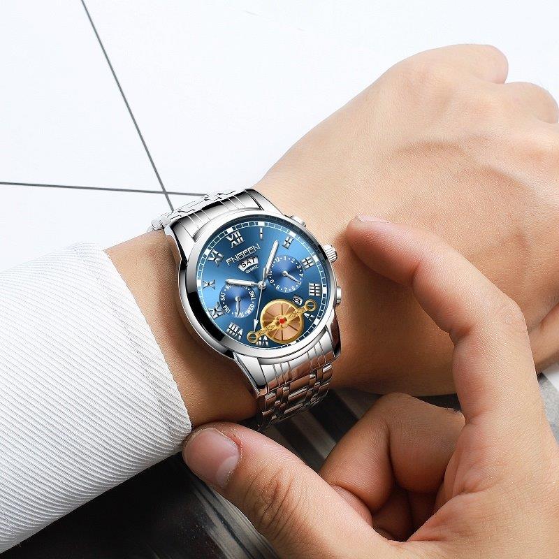 Armbåndsur med selvlysende visere – Sort rem, sølvfarvet ramme og hvid baggrund