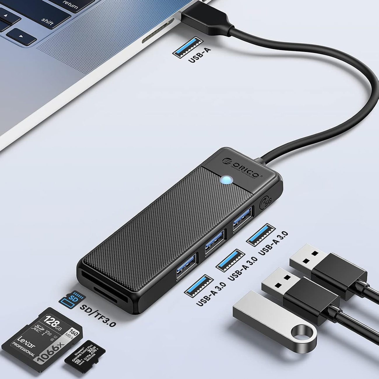 Orico PAPW3AT-U3 USB-hub med 4 porte (3x USB-A 3.0) og microSD/SD-kortlæser, 1 m – sort