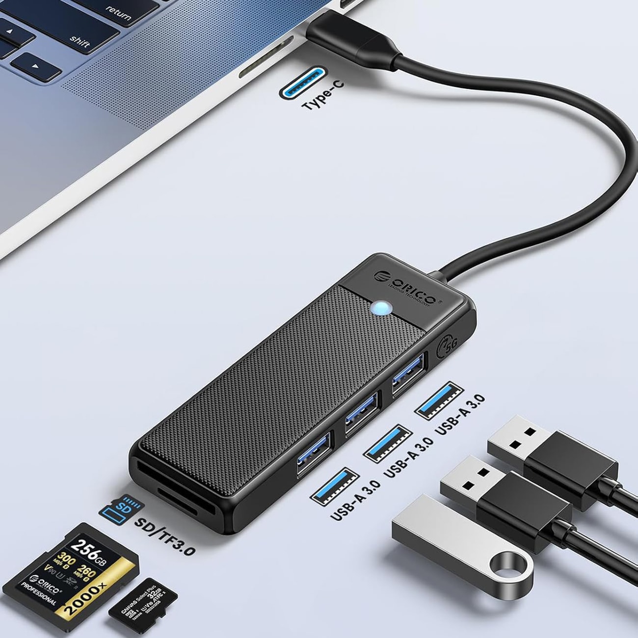 Orico PAPW3AT-U3 USB-hub med 4 porte (3x USB-A 3.0) og microSD/SD-kortlæser, 1,8 m – sort